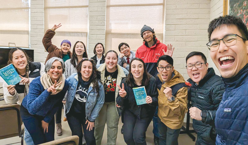 Young SGI-USA members in Oakland taking a group photo after their Ikeda Wisdom Academy meeting.